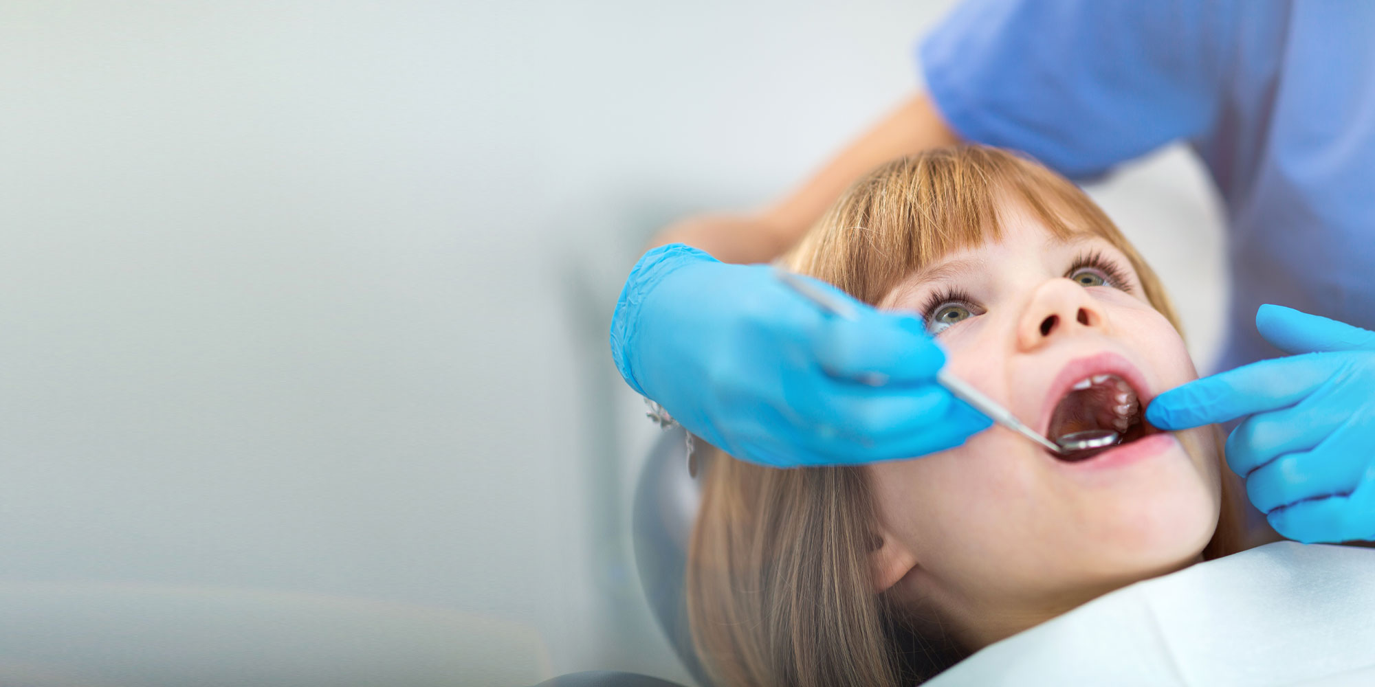 young-dental-patient-undergoing-procedure young dental patient undergoing procedure