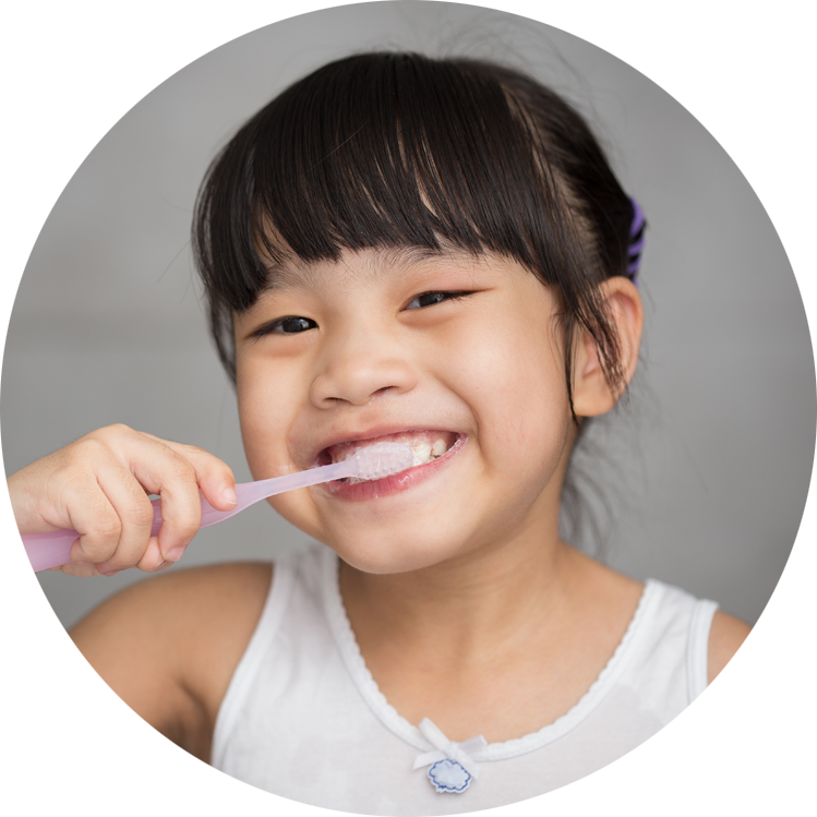 young dental patient brushing teeth