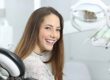 a patient smiling after her professional teeth whitening