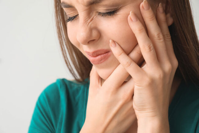 dental-patient-suffering-from-failed-implants Dental Implant Patient Suffering From A Failed Dental Implant