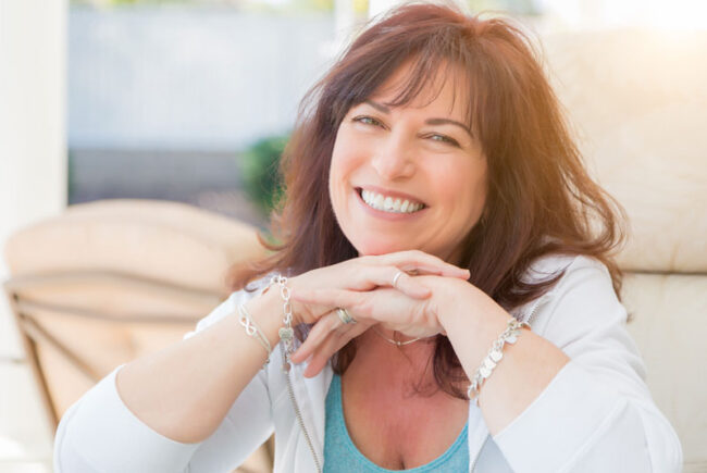 patient-smiling-after-dental-implants-procedure Dental Implant Patient Smiling After Her Dental Implant Procedure