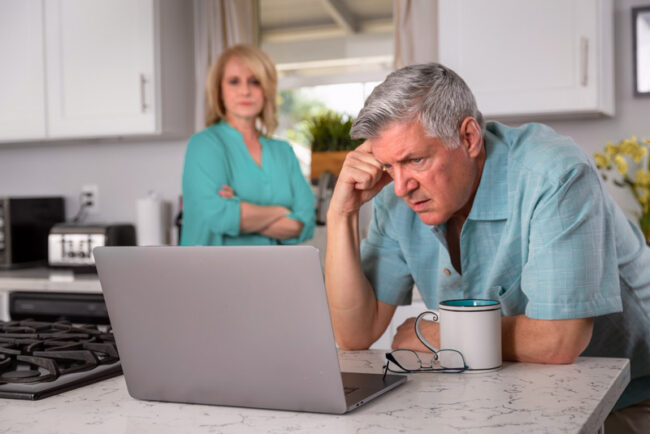 dental-implant-patient-struggling-with-bills Dental Patient Struggling With Bills