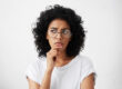 Questioning Dental Patient Wondering About Dental Implant Procedures