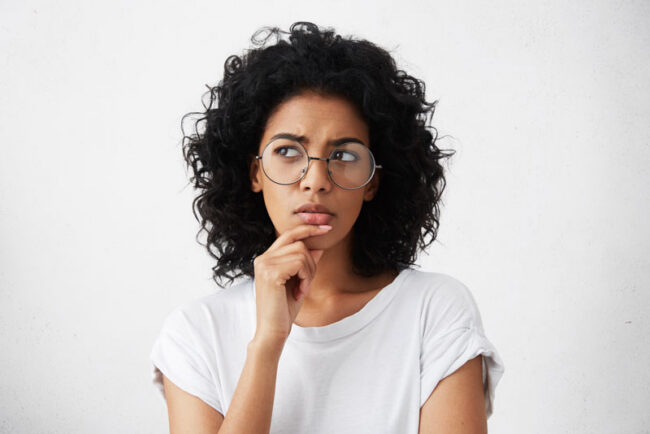 questioning-dental-patient-2 Questioning Dental Patient Wondering About Dental Implant Procedures