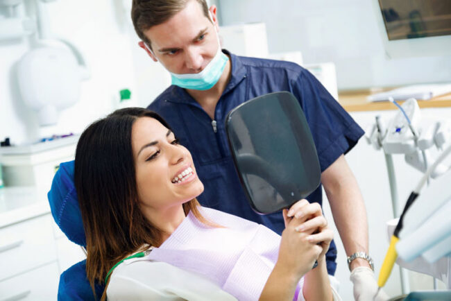 dental-patient-undergoing-procedure a full mouth dental implant patient undergoing dental implant surgery