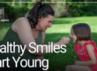 mother and child smiling outside